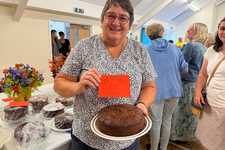 Elizabeth Daw had a first prize with her fruit cake. AQ 1027