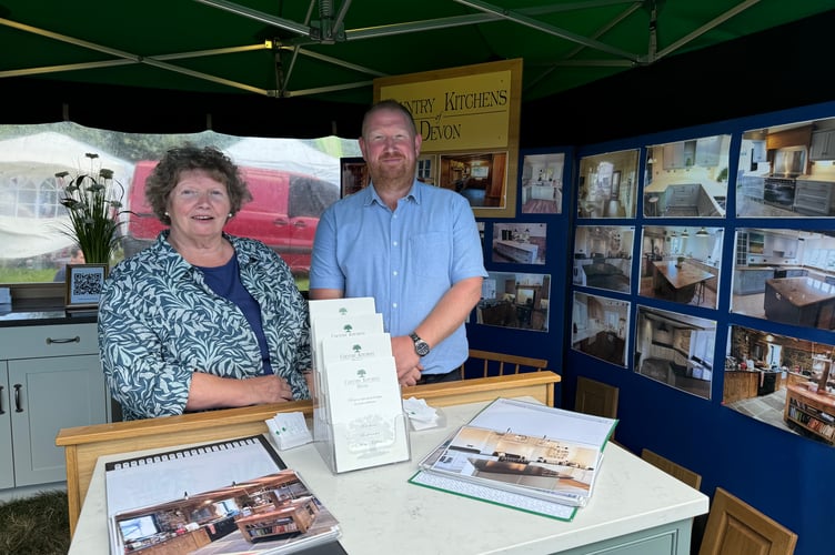 Country Kitchens of Devon were kept busy talking to prospective customers at Chagford Show.  AQ 0719