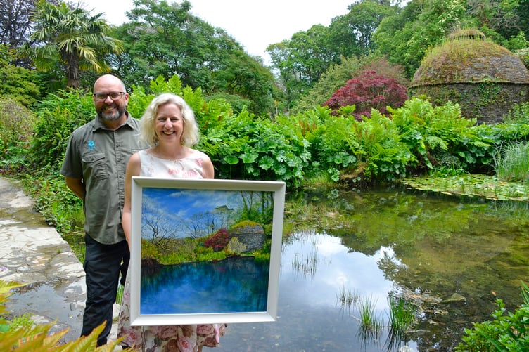 ARTIST Clare Law has been inspired by some of her favourite spots in the garden at Cotehele. Here with gardener Dave Bouch at the Stewpond and Dovecote, where reflections are captured on the water