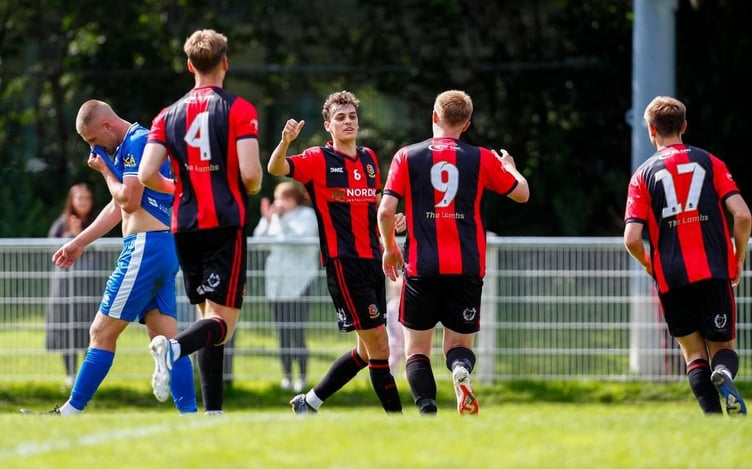 Charlie Elkington and Liam Prynn celebrating for Tavi