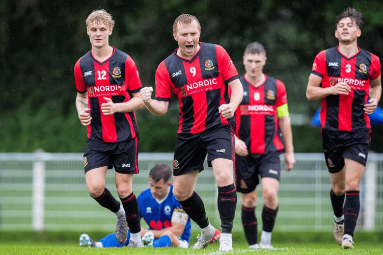 Liam Prynn celebrates for Tavi