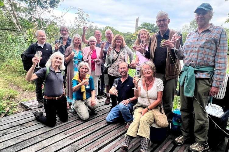 Local councillors and guests celebrate the reopening of the boardwalks and viewing platform at Okel Tor Mine with owners Jon and Jenny Tully. Picture: Kerenza Moore