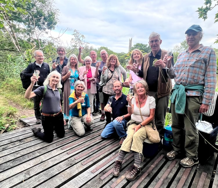 Local councillors and guests celebrate the reopening of the boardwalks and viewing platform at Okel Tor Mine with owners Jon and Jenny Tully. Picture: Kerenza Moore