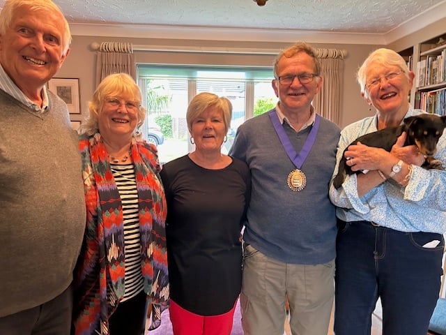 Bob Hines, mayoress Sheila Hines, town mayor Allenton Fisher and Anne Brokenbrow holding Tully the dog at the Hospiscare coffee morning