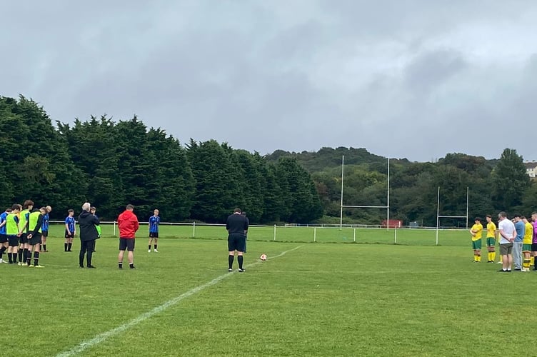 U-18 footballers pay tribute, with a minute's silence, to former talented young player Daniel Willis at a match in Tavistock