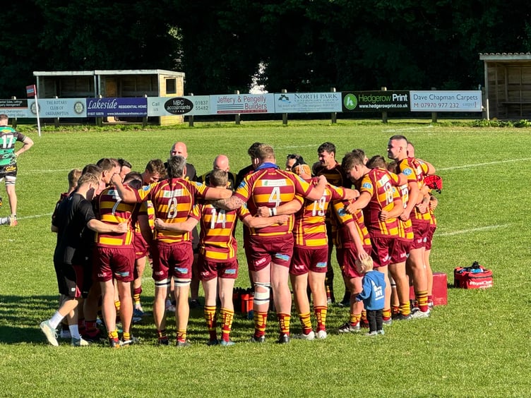 Post-match huddle for Okehampton