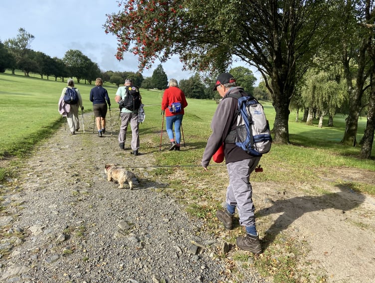 Members of Okehampton Rambling Club cross the golf club as they take advantage of the weather for an impromptu outing on Sunday