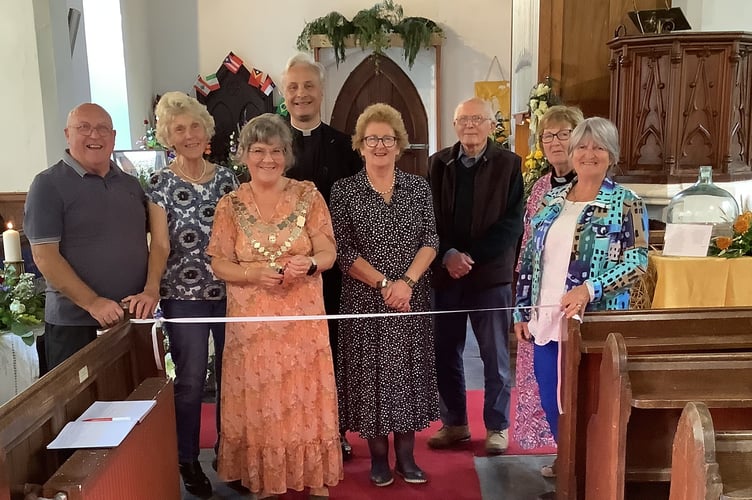 County Councillor Debo Sellis opens Gulworthy Church Flower Festival.