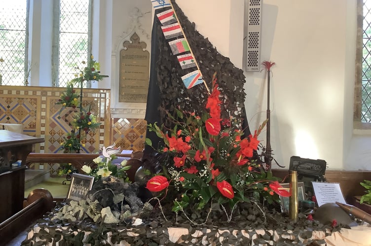 Gulworthy Flower Festival display World Wars by Rosie Steer.