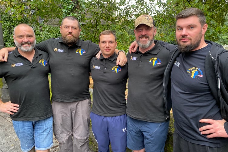 Adventurer Lee Spencer with his team of Ukrainian war wounded ready for their ocean row - Ivan Gavrylk