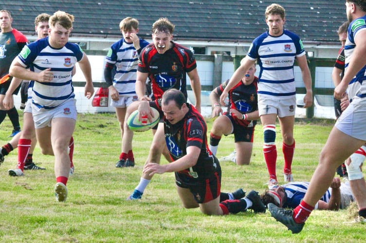 Liam Watts touches down for one of his tries