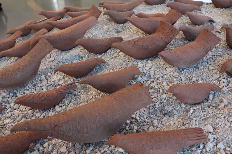 Close-up of Kate Anstead's MA final sculpture Red List, of birds at risk.