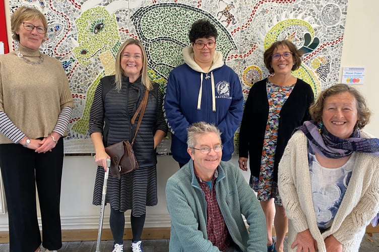 A friendly dragon awaits visitors to Tavistock Library in the form of a mosaic made by residents.