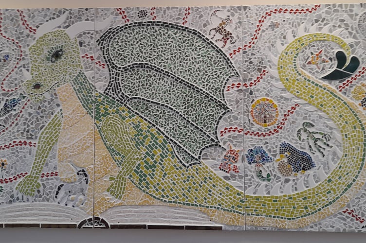 Residents created this appealing dragon mosaic with West Devon Arts Workshops, now on permanent display at Tavistock Library. 