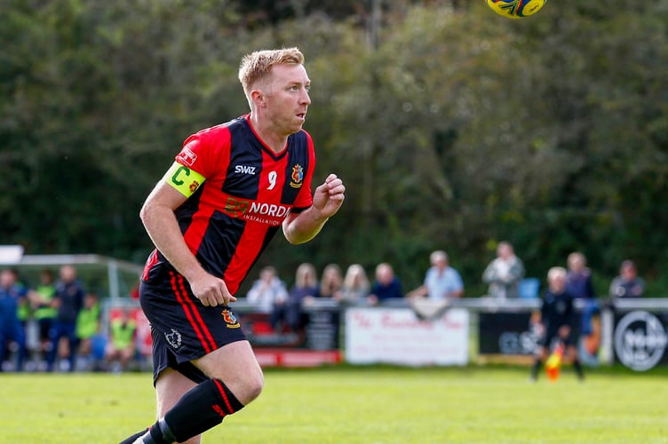 Tavi captain Liam Prynn with his eyes on the ball