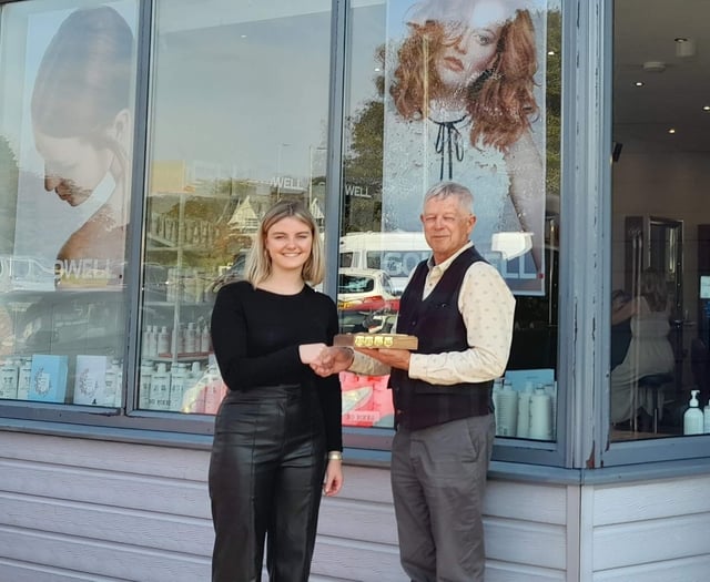 Yelverton shop presented with Harrowbeer 1940s Day trophy