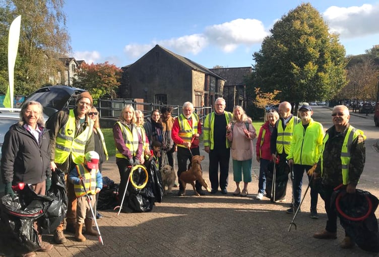 Members of Tidy Tavi marking 13 years of keeping Tavistock tidy