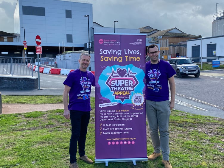 Andy Keeble and Tom Darby Clark from the Royal Devon Hospitals Charity in front of the site for the new 'super theatre' at the hospital