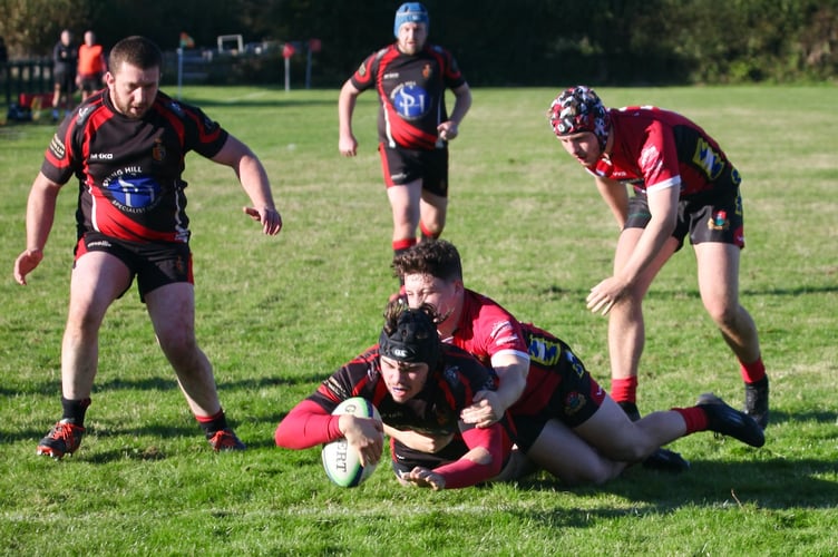 Charles Bowden reaches the line for another score