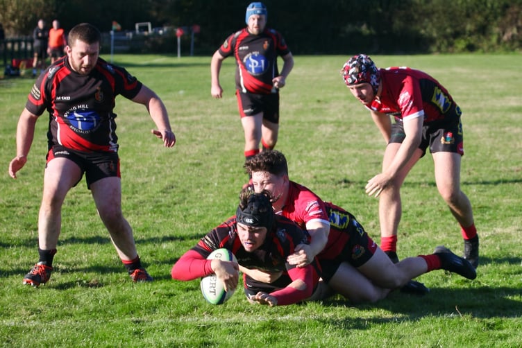 Charles Bowden reaches the line for another score
