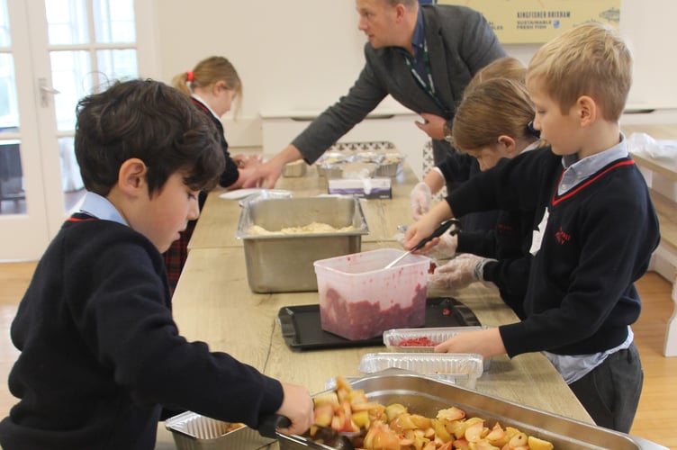Mount Kelly College apple crumble-making for charity.