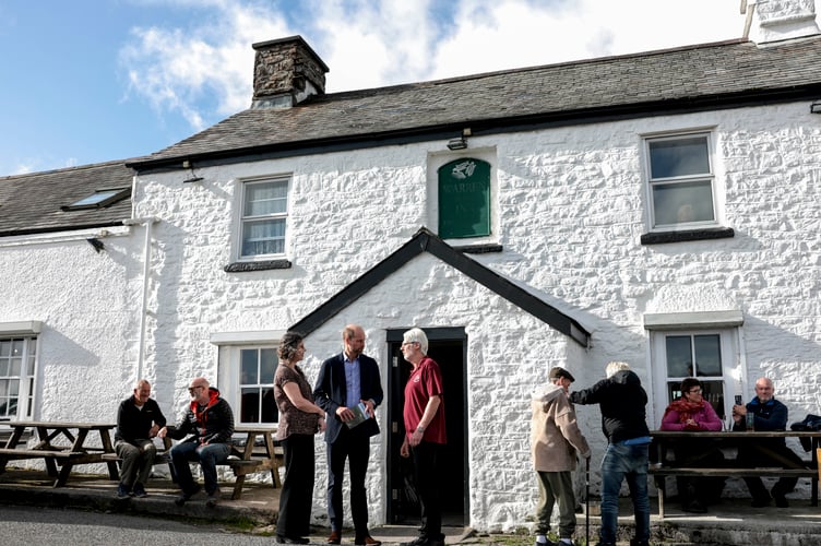 The Duke of Cornwall during a visit to the Warren House Inn pub at Postbridge, Yelverton. 
