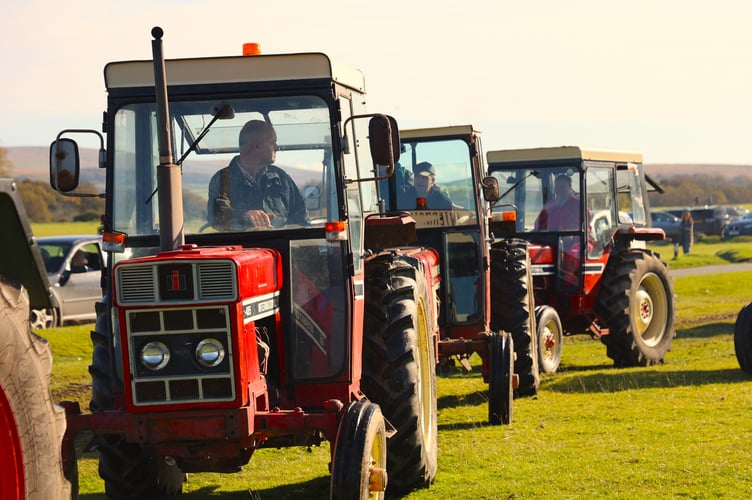 Tractor comrades-in-arms as a few Case IH harvester tractors park up on Yelverton's former airfield for a rally to entertain families and tractor fans.