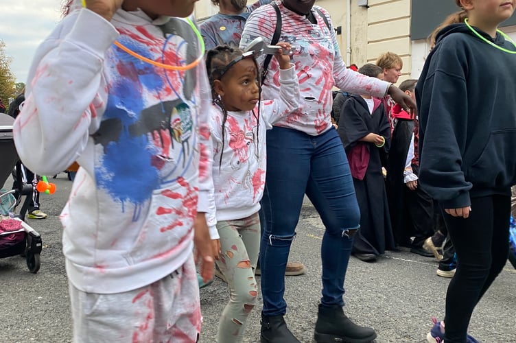 Makena Tozer, 5,  and her wrench head wound bring horror to Tavistock Halloween Parade today.