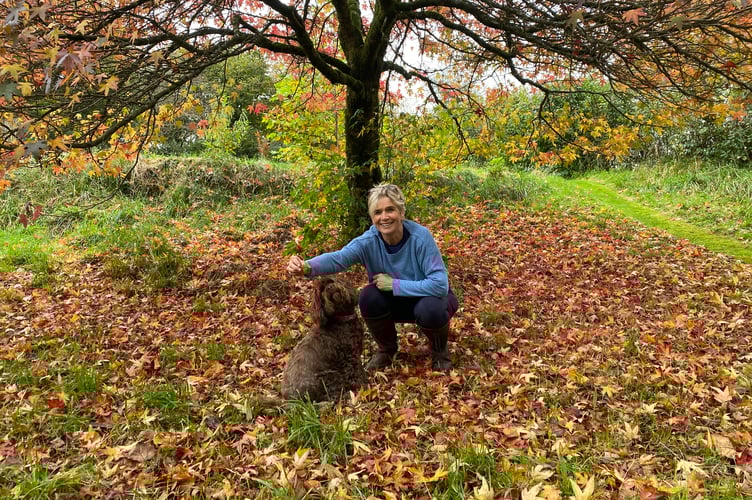 Annie Charles and Rosie in her Sheepstor garden where he runs the Blooming Well gardening therapy project.