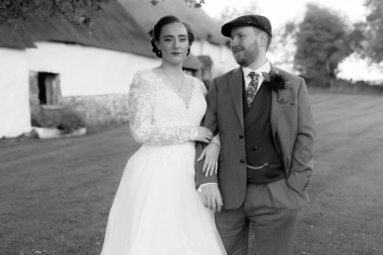 Steam buffs Alex and Kayleigh on their wedding day.