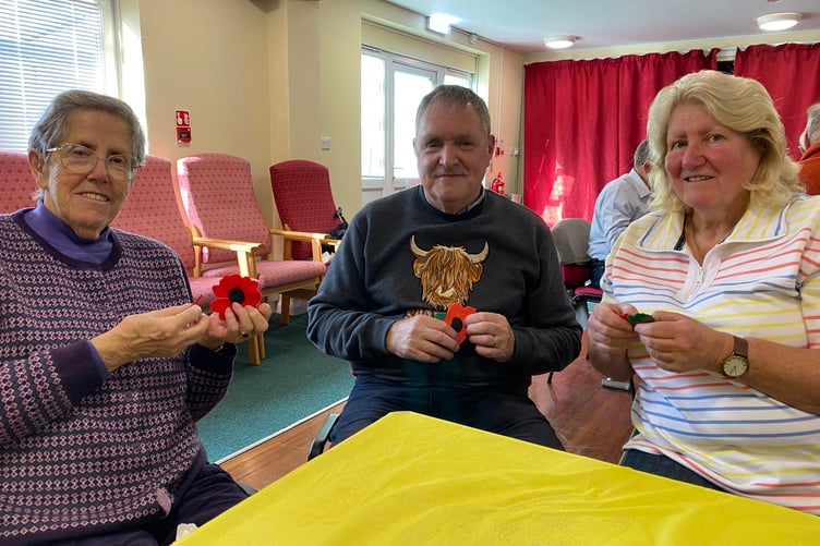 Mary Budge, David Eggins and Debbie finding friendship and common experiences at Tavistock Stroke Club.