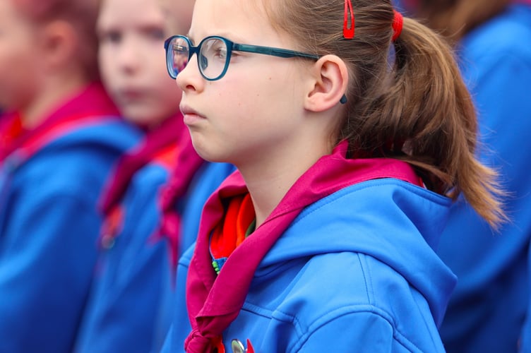 A reflective Scout at Tavistock Remembrance Sunday service..