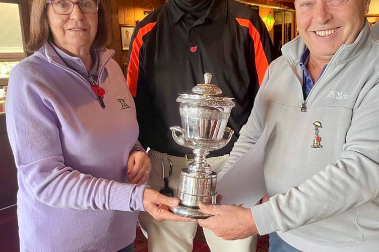 Dora Milner Trophy Winners Andrew Madgwick and Mary Keir (centre & left) presented by Kevin Harding (R)