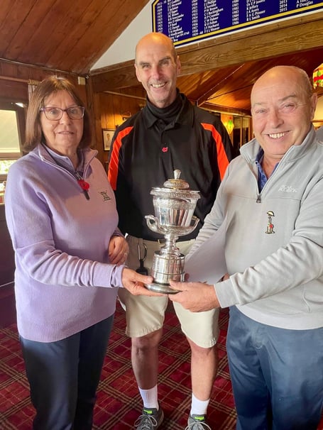 Dora Milner Trophy Winners Andrew Madgwick and Mary Keir (centre & left) presented by Kevin Harding (R)