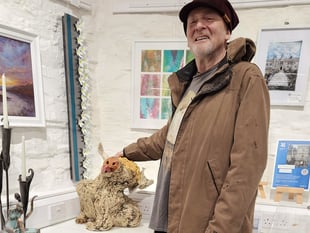 Sculptor at Cotehele exhibition