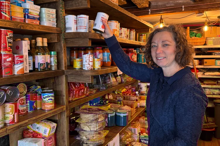 An Okehampton Community Kitchen volunteer in the storeroom