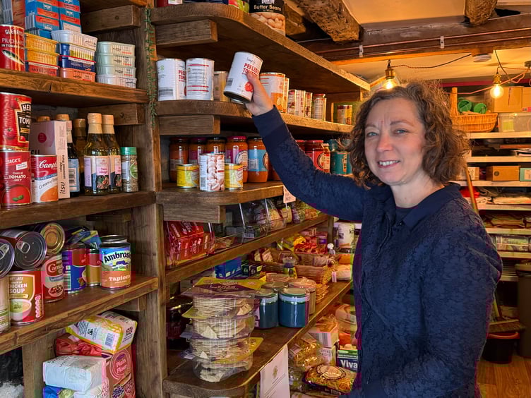 An Okehampton Community Kitchen volunteer in the storeroom