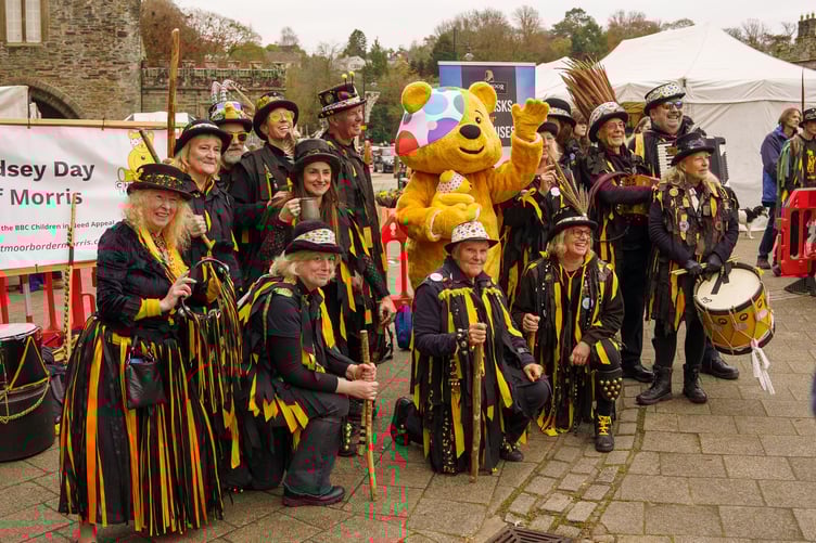 Morris dancers with Pudsey bear for Pudsey day of Morris 2024