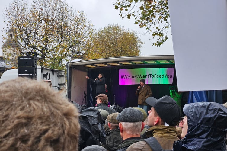 Yelverton farmer Mat Cole listens to TV's celebrity farmer Jeremy Clarkson speaking in support of the anti-inheritance tax plan in London today.