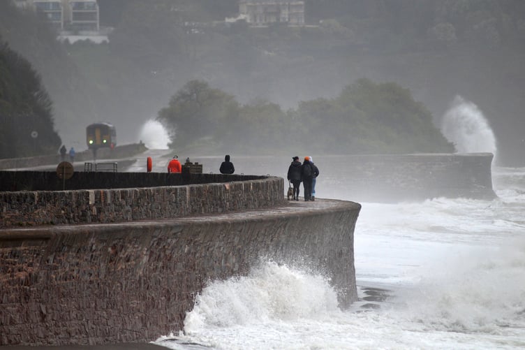 Storm Bert. Waves batter the sea wall walk at Teignmouth