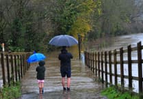 Heavy rain may cause travel disruption and flooding this weekend, Met Office says