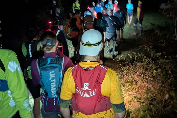 In the dark - the Burrator Noir multi-terrain race runners need their head torches.