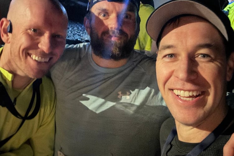 Adventurers tackle the Burrator Reservoir off-road race in the dark.