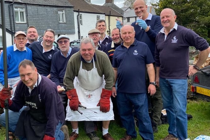 Horrabridge Cavaliers, pictured here at their summer barbecue, are getting ready for their annual pre-Christmas Bottle Auction