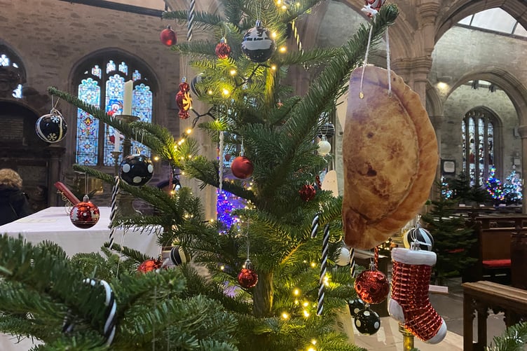 The Original Pasty House at Tavistock Christmas Tree Festival hung with pasty model.