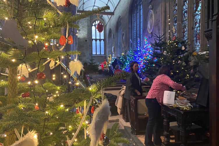 St Paul's Church, Gulworthy at Tavistock Christmas tree Festival themed after the film It's a Wonderful Life - hung with angel wings