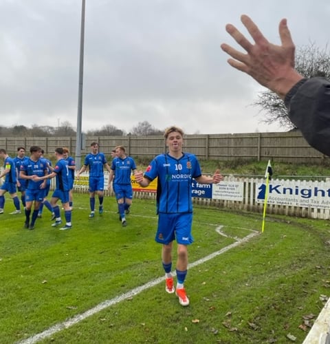 Harry French celebrating the opener for Tavistock AFC