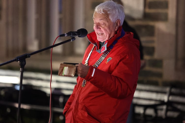 Tavistock Lions Club Chairman Alan Wroath conducts the Trees of Light lighting ceremony in Bedford Square. 