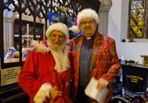 Church sparkles on Christmas tree night