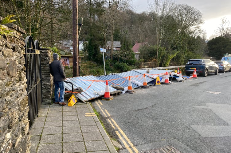 Storm Darragh flattened some heavy duty metal fences protecting a broken riverside wall on Market Road, Tavistock on Saturday